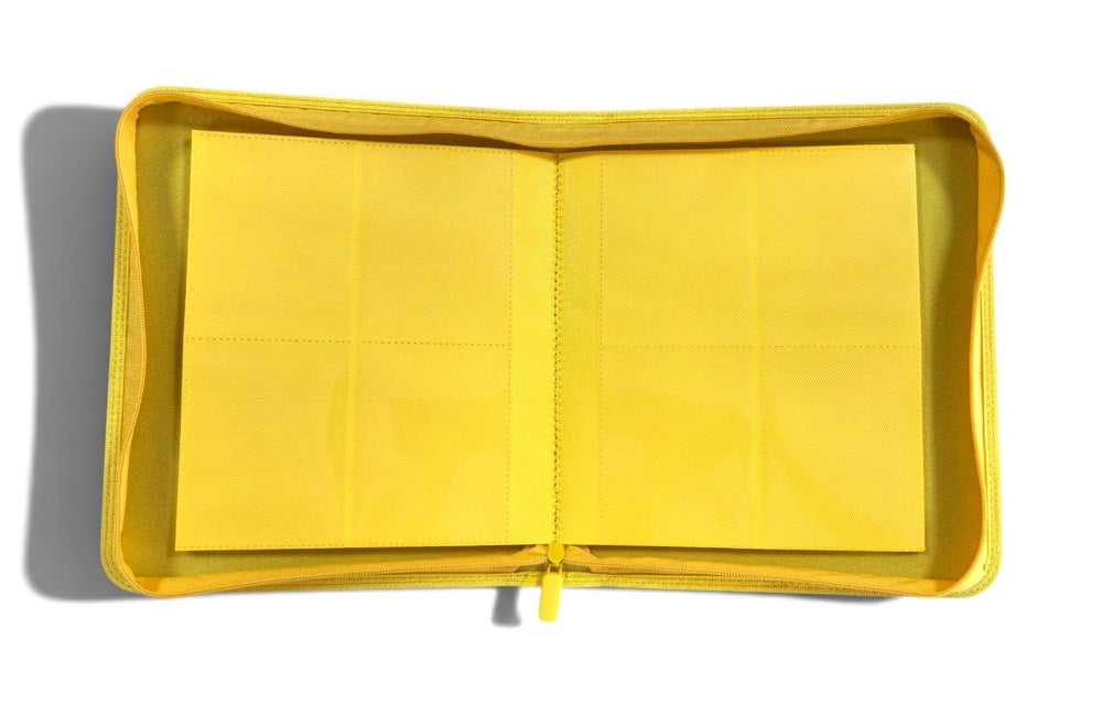 Stay Flat 4-pocket binder open flat, 2 by 2 pockets per page